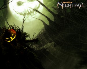 Guild Wars Nightfall Scarecrow Wallpaper with glowing pumpkin face and green moonlit fantasy scene